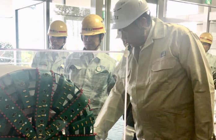SUBWAY PLANNING. Transportation Secretary Arthur Tugade inspects the scale model of the tunnel-boring machine that will be used for the construction of the Metro Manila Subway. Photo from the Department of Transportation 