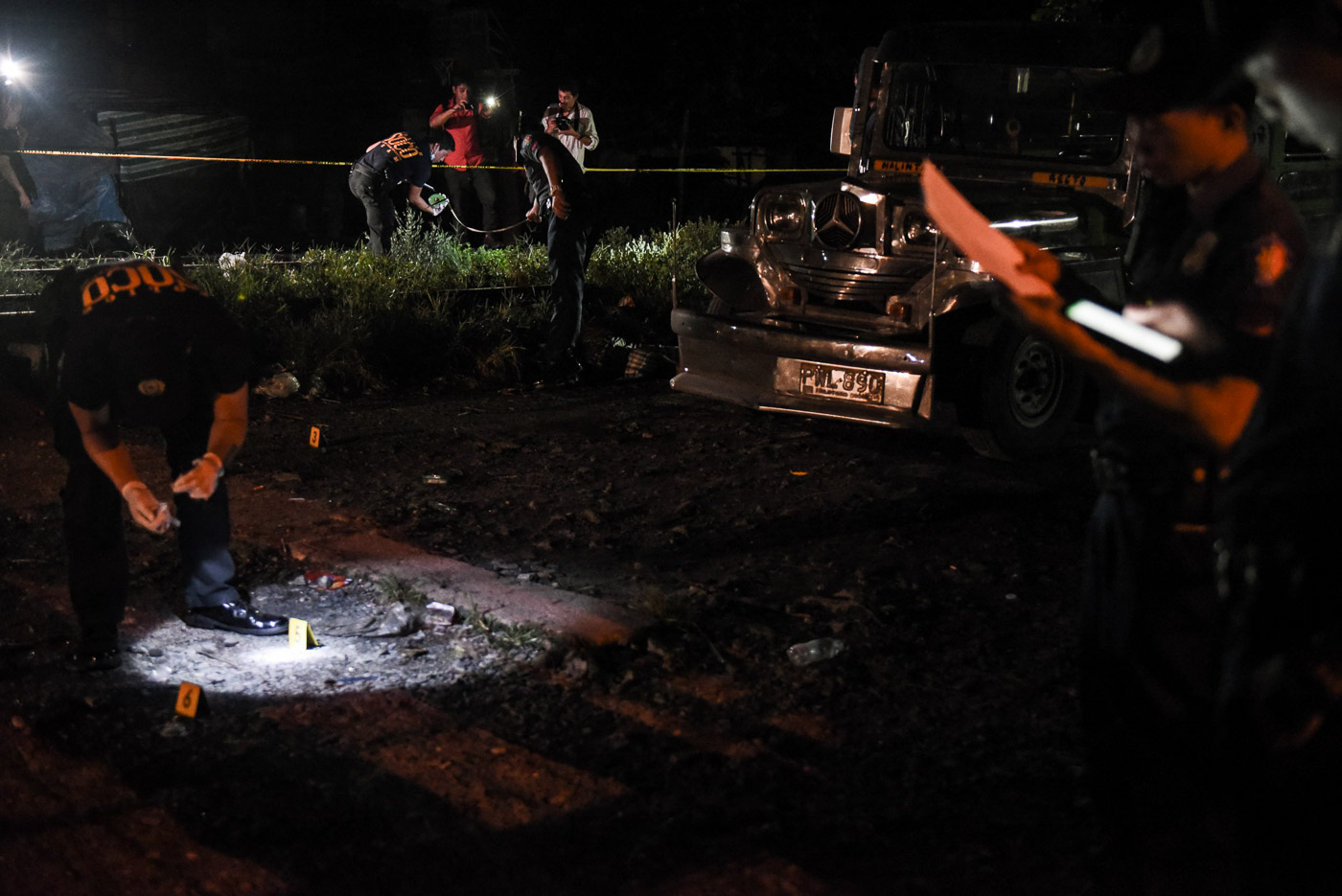 PROBE. Scene of the Crime Operatives at a crime scene in Caloocan City, Spetember 30, 2016. Photo by LeAnne Jazul/Rappler/File