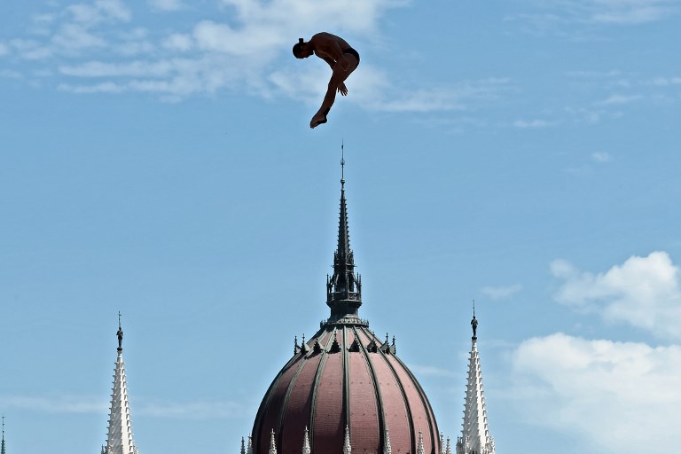 HIGH DIVING. Columbia's Orlando Duque during round 3 of the men's High Diving competition at the 2017 FINA World Championships in Budapest on July 30, 2017. Photo by Ferenc Isza/AFP  
