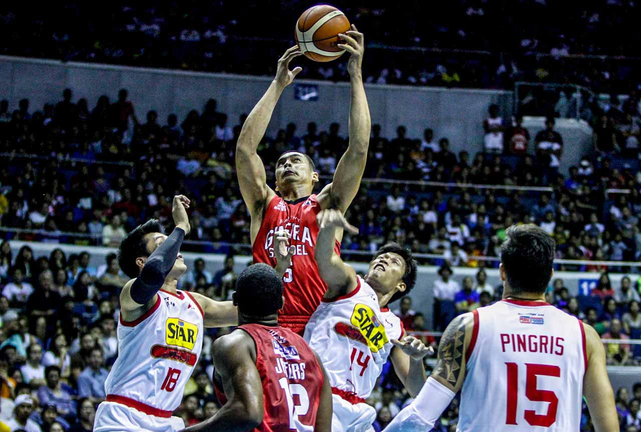 Japeth Aguilar (C) says he is committed to playing defense for Barangay Ginebra. Photo courtesy of PBA Media Bureau