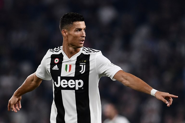 BACK OF THE NET. Cristiano Ronaldo fires a goal to cap off an emphatic win by Juventus. File photo by Marco Bertorello/AFP   