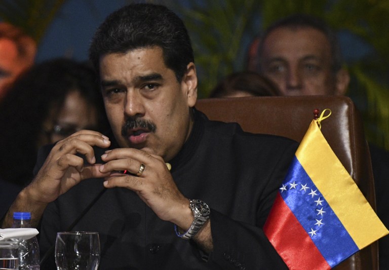 CONDEMNED. Venezuela President Nicolas Maduro refuses to accept aid from other countries, especially the United States, seeing it as a prelude to an invasion. File photo by Aizar Raldes/AFP 