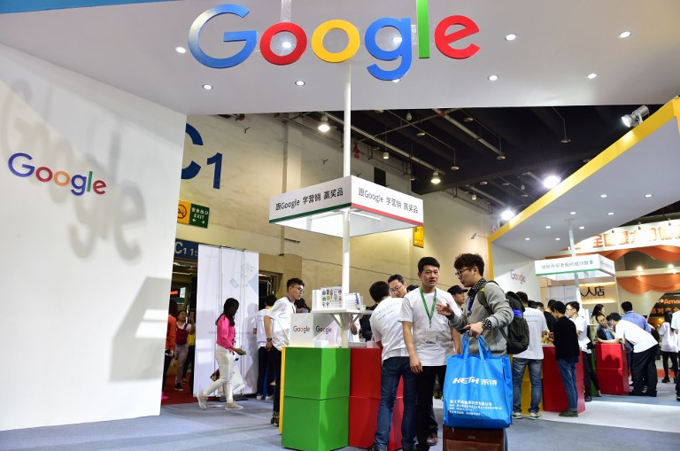 GOOGLE CHINA. This photo taken on April 11, 2016 shows visitors gathering at Google booth during the 2016 China International Electronic Commerce Expo in Yiwu, east China's Zhejiang province. AFP Photo/STR 