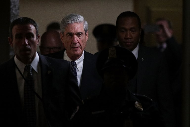 CHIEF INVESTIGATOR. Special counsel Robert Mueller (2nd L) leaves after a closed meeting with members of the Senate Judiciary Committee June 21, 2017 at the Capitol in Washington, DC. Alex Wong/Getty Images/AFP 
