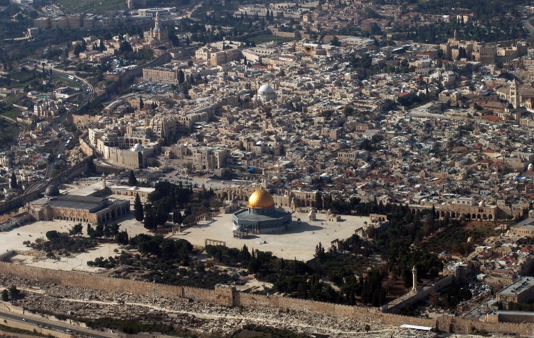 CENTER OF DISPUTE. This file photo taken on January 11, 2010 shows an aerial view of Jerusalem's Old City, including the Al-Aqsa mosques compound, with the landmark Dome of the Rock mosque in the center. Marina Passos/File/AFP 