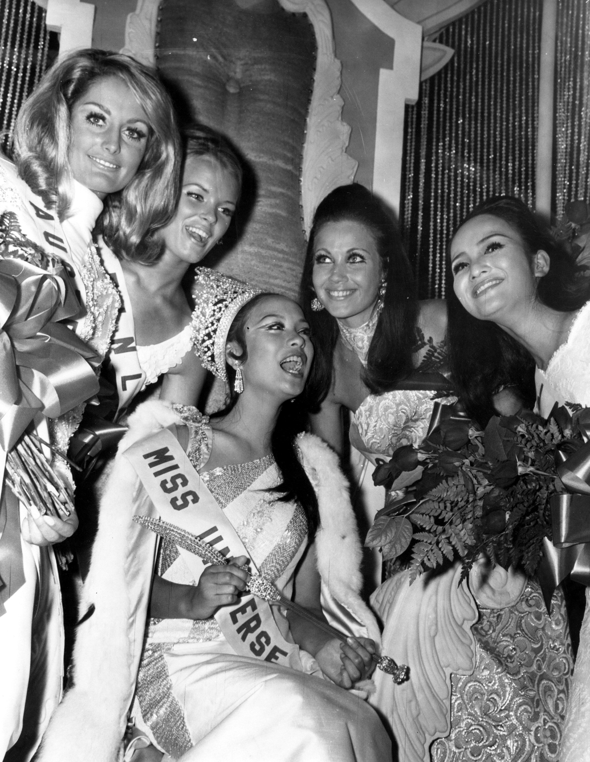 MISS UNIVERSE 1969. Gloria Diaz, Miss Universe 1969, is surrounded by well-wishers after she is crowned during the 18th edition of the pageant. Photo from Miss Universe Organization 