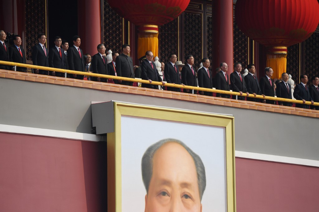 SHOW OF FORCE. Chinese President Xi Jinping (7th L) attends a military parade with former presidents Hu Jintao (6th L) and Jiang Zemin (8th L) in Tiananmen Square in Beijing on October 1, 2019, to mark the 70th anniversary of the founding of the People's Republic of China. Photo by Greg Baker/AFP 