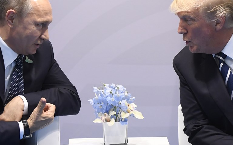 TRUMP AND PUTIN. US President Donald Trump (R) and Russian President Vladimir Putin hold a meeting on the sidelines of the G20 Summit in Hamburg, Germany, July 7, 2017. Saul Loeb/AFP 