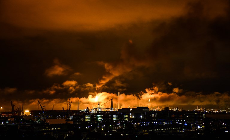 ABLAZE. A photo taken at night on July 29, 2017 shows flames and smoke rising above the Shell refinery in Rotterdam. Photo by Bjorn Remmerswaal/ANP/AFP 