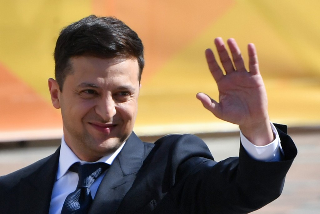 IMF AID. Ukrainian President Volodymyr Zelensky waves to supporters as he arrives for his inauguration ceremony in Kiev on May 20, 2019. File photo by Sergei Supinsky/AFP 