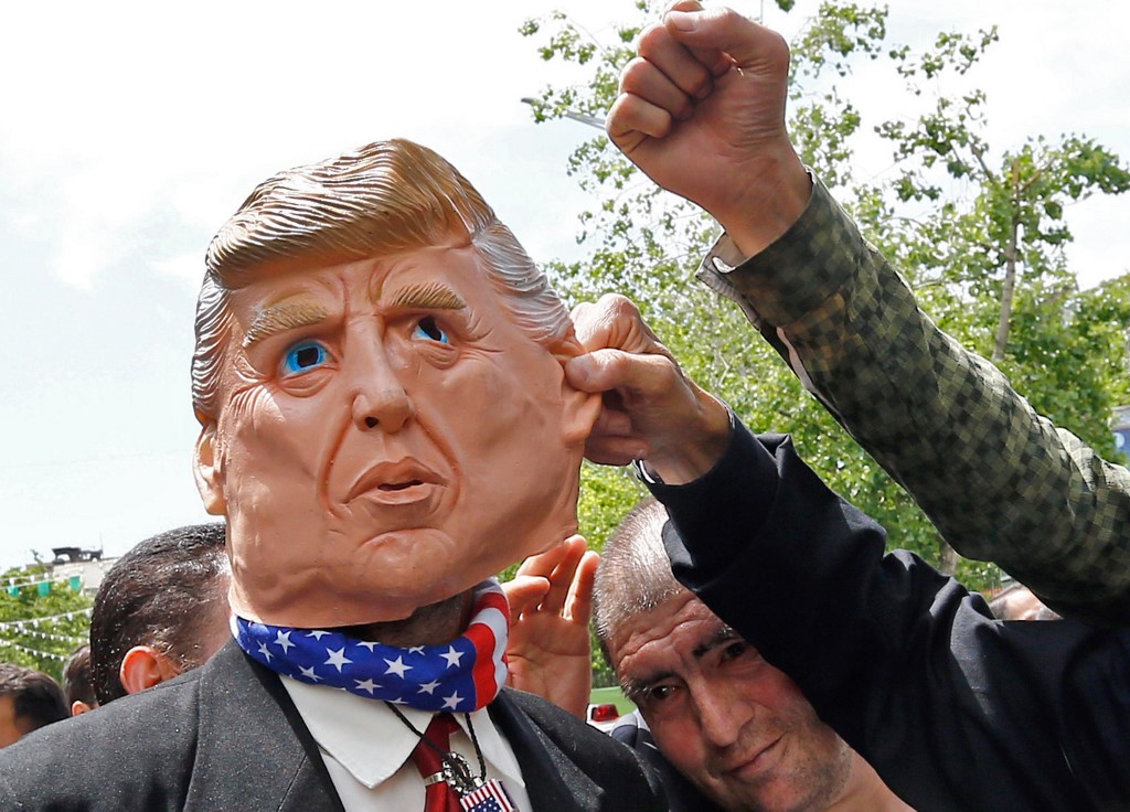 US-UN MEETING. The US calls for a meeting with the UN Security Council on Iran. File photo shows Iranian demonstrators gesturing around a mask depicting US President Donald Trump during a rally in Tehran. Photo by STR/AFP 