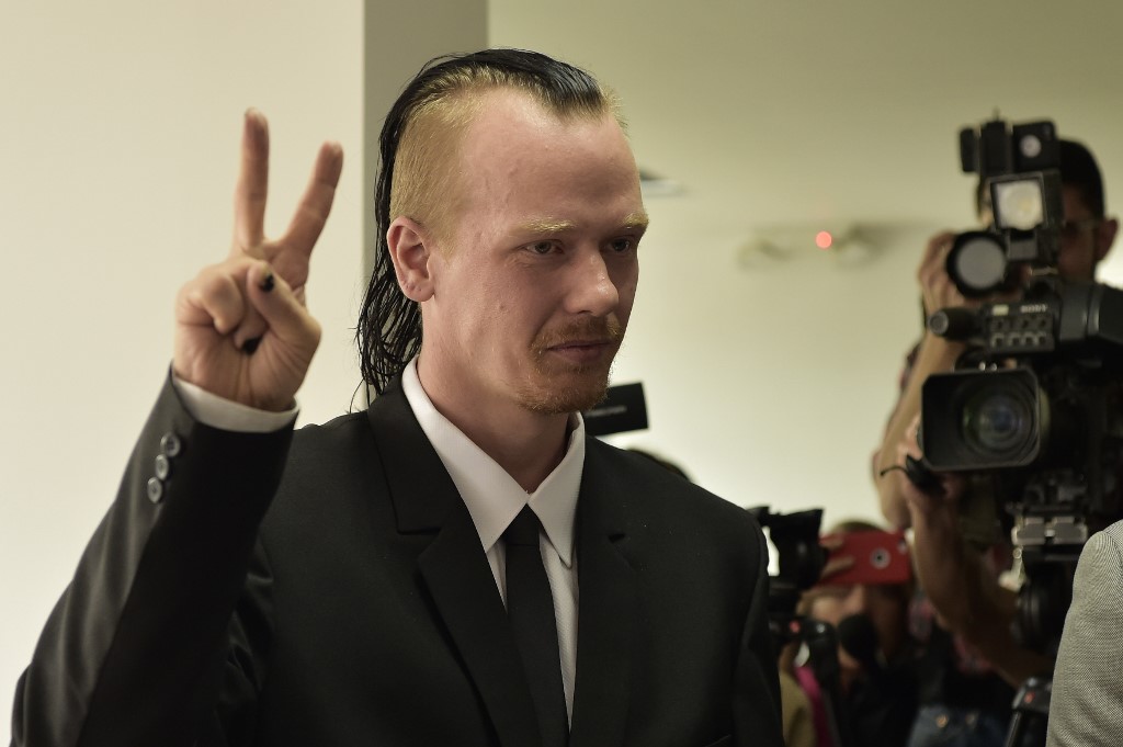 RELEASED. Ola Bini, a Swedish national accused of an alleged cyber-attack and who is close to WikiLeaks founder Julian Assange, gestures before the appeal hearing to his order of preventive detention, at the Provincial Court of Pichincha in Quito, on May 2, 2019. File photo by Rodrigo Buendia/AFP 