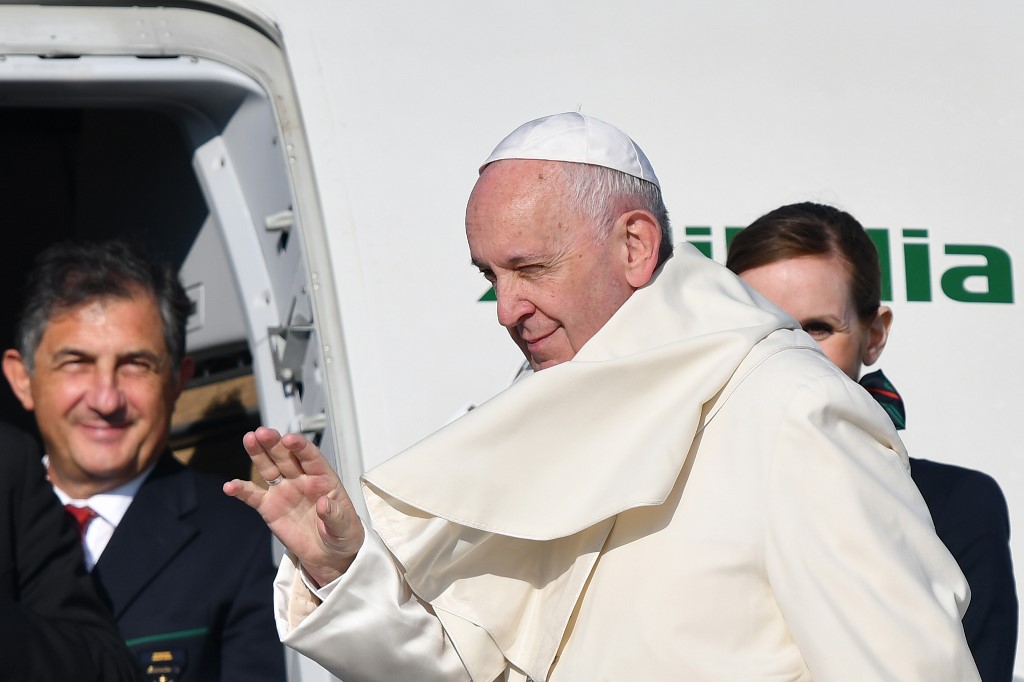 IRAQ INVITES POPE. In this file photo, Pope Francis waves as he boards a plane upon his departure for a three-day trip to Romania, on May 31, 2019 at Rome's Fiumicino airport . File photo by Alberto Pizzoli/AFP 
