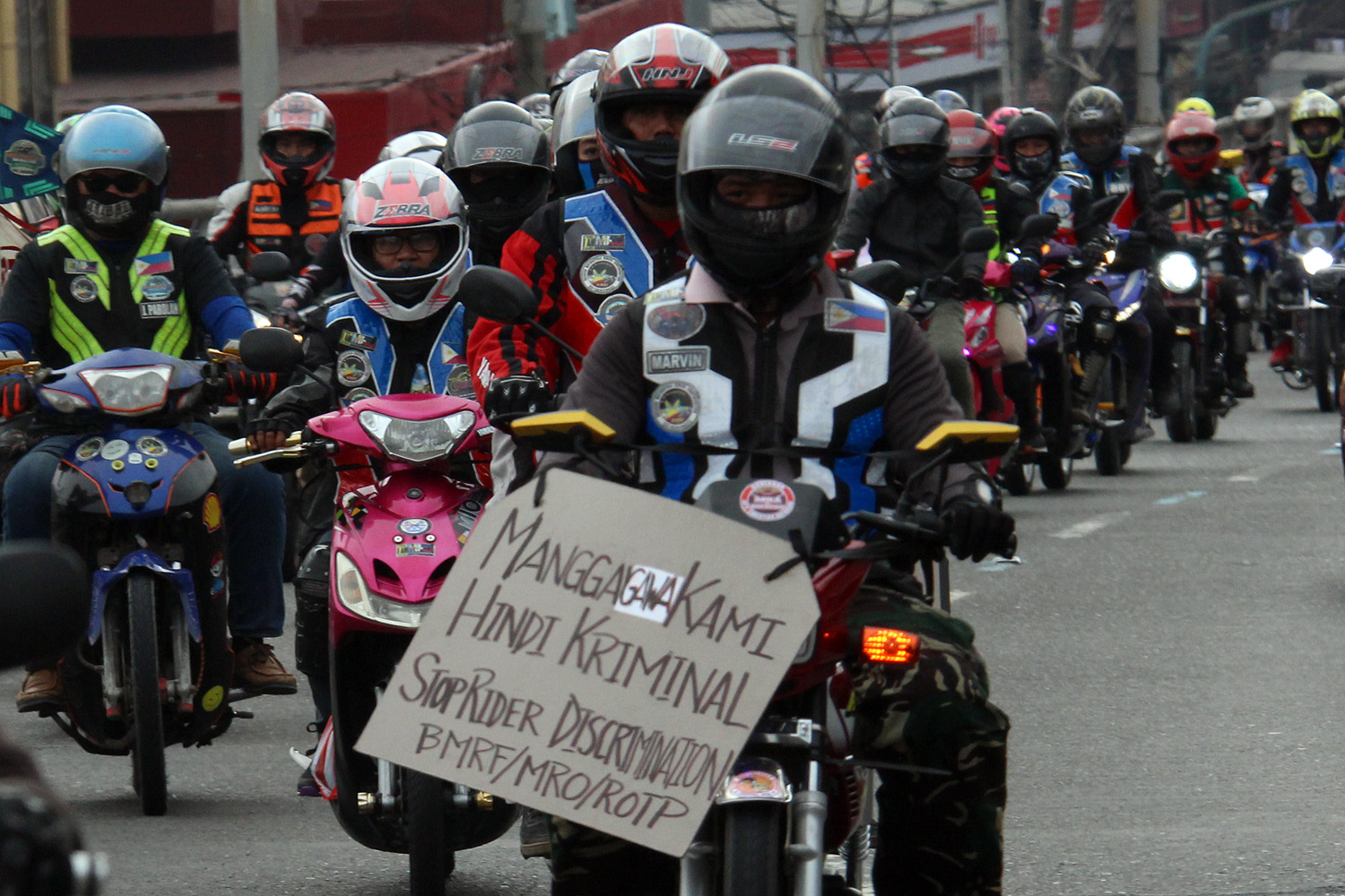 LEGAL SOON? Angkas riders join a Unity Ride on December 16, 2018, to protest the shutdown of their operations. File photo by Darren Langit/Rappler 