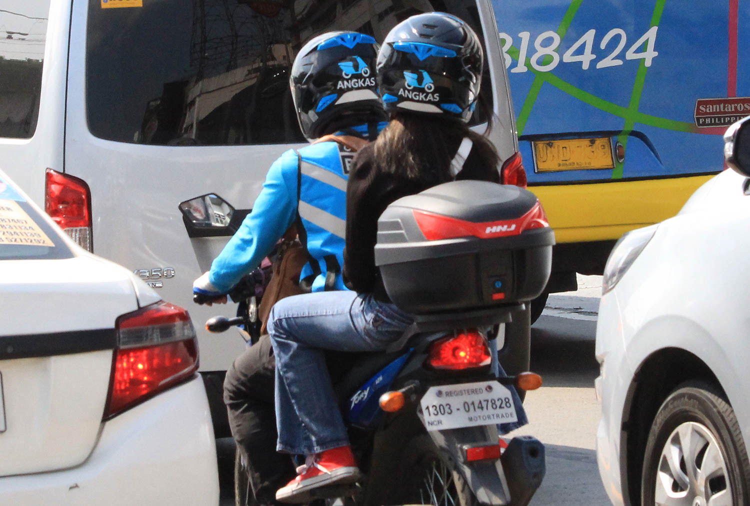 MOTORCYCLE TAXIS. Will the extension and expansion of the motorcycle taxi pilot run benefit the riding public? File photo by Darren Langit/Rappler