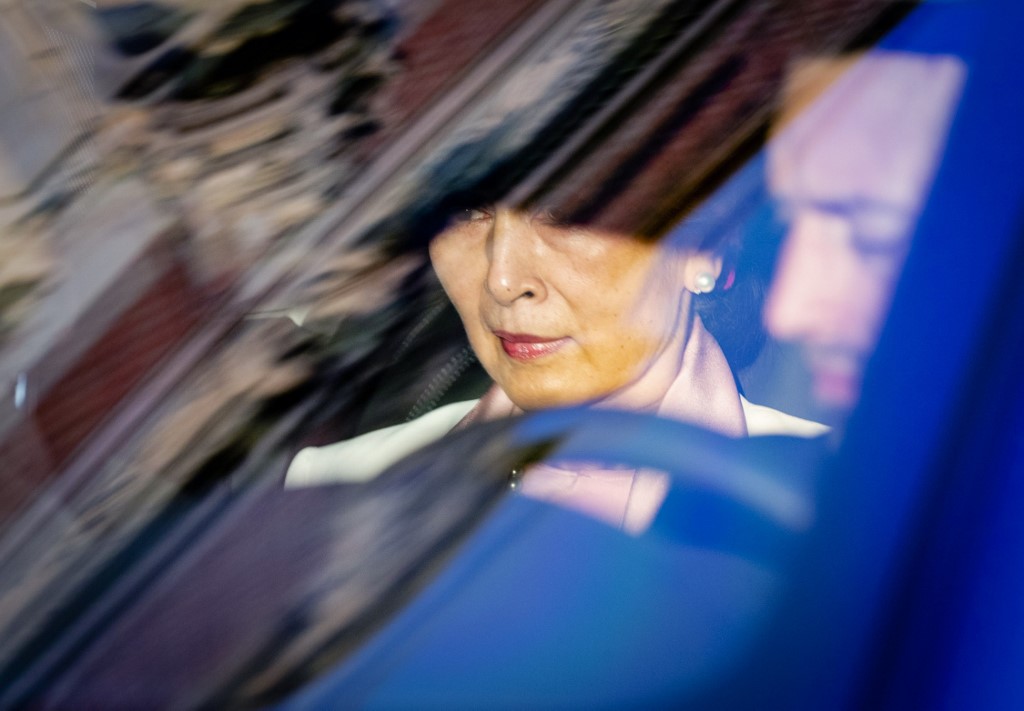AUNG SAN SUU KYI. Myanmar's State Counsellor Aung San Suu Kyi arrives in a car on the last day of hearing on the Rohingya genocide case before the UN International Court of Justice at the Peace Palace in The Hague, on December 12, 2019. Photo by Sem Van Der Wal/ANP/AFP 