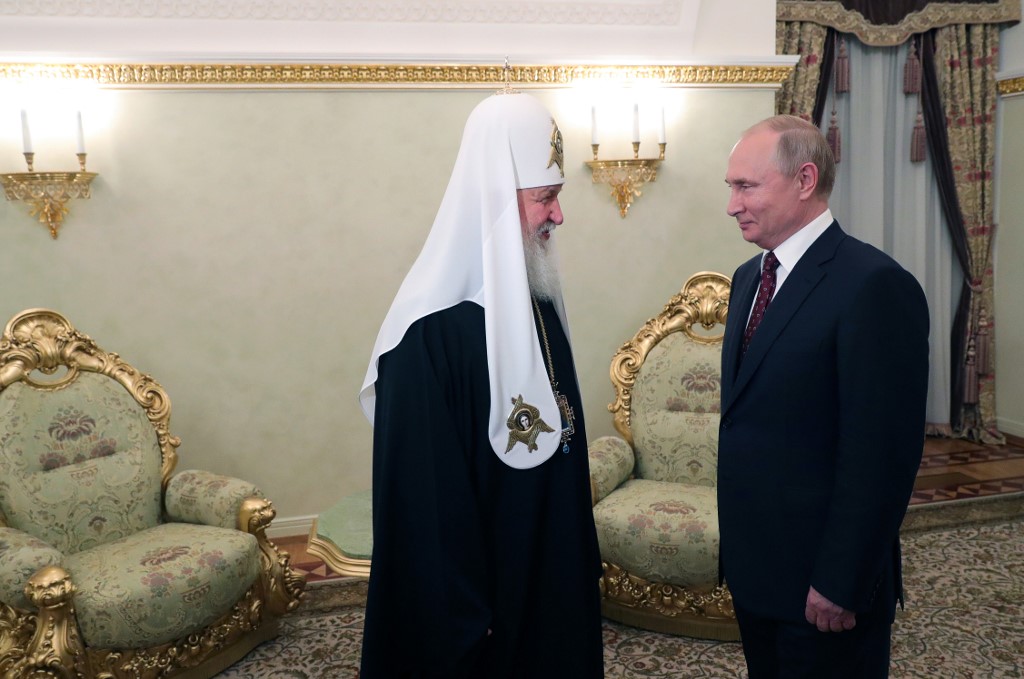 PATRIARCH KIRILL. Russian President Vladimir Putin (R) meets with Patriarch Kirill, the head of the Russian Orthodox Church, to commemorate the day of Saints Cyril and Methodius at the Kremlin in Moscow on May 24, 2019. File photo by Mikhael Klimentyev/Sputnik/AFP 