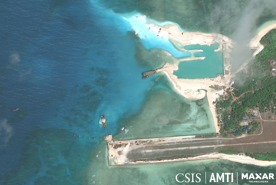 SLOWLY BUT SURELY. This satellite image from February 2020 shows significant progress in the repairs on Pag-asa's runway, and on the construction of a beaching ramp and a harbor nearby. Photo from AMTI-CSIS 