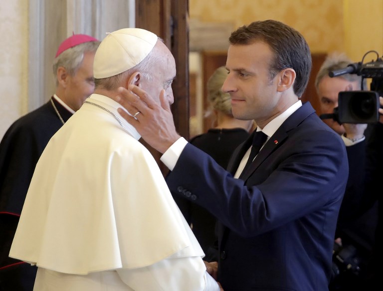 VATICAN AUDIENCE. French President Emmanuel Macron (R) greets Pope Francis at the end of a private audience at the Vatican on June 26, 2018. Photo by Alessandra Tarantino/AFP/Pool  