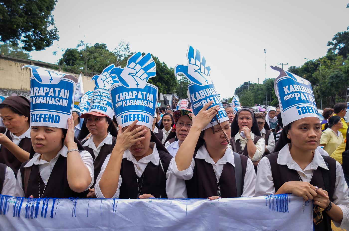 RESPECT FOR HUMAN RIGHTS. Catholic nuns call for the respect for human rights during the 'Power of We' rally. Photo by LeAnne Jazul/Rappler
 
