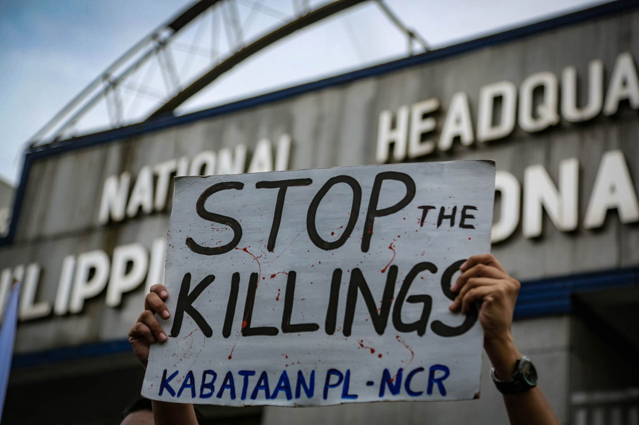 DRUG WAR PROBE SOUGHT. Activists hold a protest against killings linked to the government's crackdown on illegal drugs. Photo by Jire Carreon/Rappler 