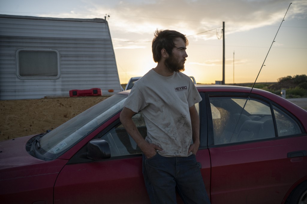 NOW JOBLESS. Jace Gentry, 21, from Hornbeck, Louisiana, is pictured in front of his trailer in Carlsbad, New Mexico, on May 6, 2020. Photo by Paul Ratje/AFP 