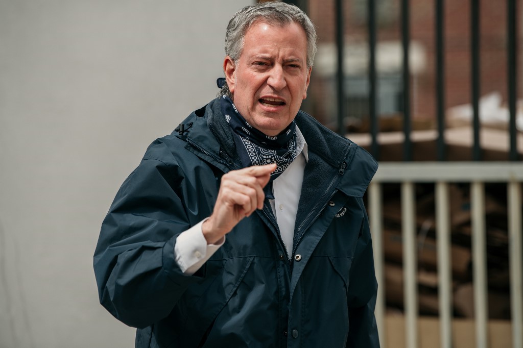 BILL DE BLASIO. New York City Mayor Bill de Blasio speaks at a food shelf organized by The Campaign Against Hunger in Bed Stuy, Brooklyn on April 14, 2020 in New York City. File photo by Scott Heins/Getty Images/AFP 