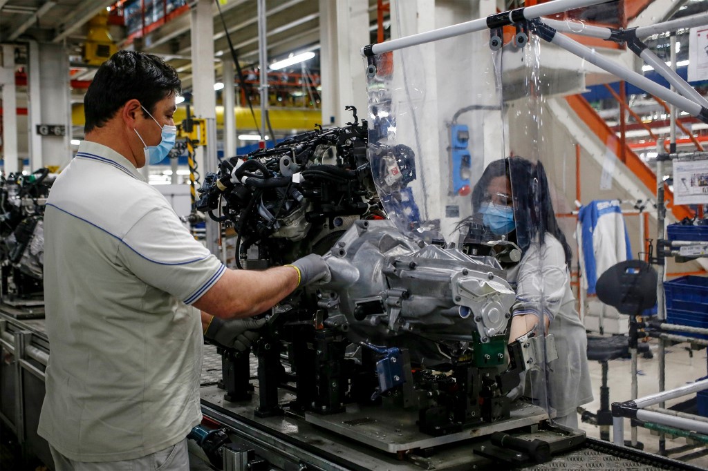 MANUFACTURING. Employees resume work at the SEVEL car factory in Atessa, Italy, on April 27, 2020. SEVEL is a joint venture between Fiat Chrysler Automobiles and PSA Group. Photo by FCA/AFP 