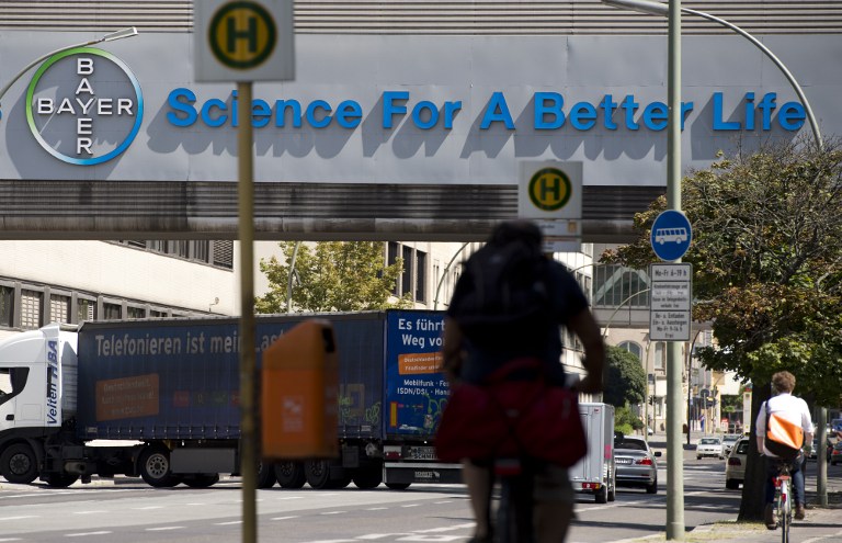 TALKS WITH MONSANTO. The logo of German pharmaceuticals and chemicals giant Bayer is seen on an overpass at its Berlin headquarters on July 24, 2013. File photo by John MacDougall/AFP  
