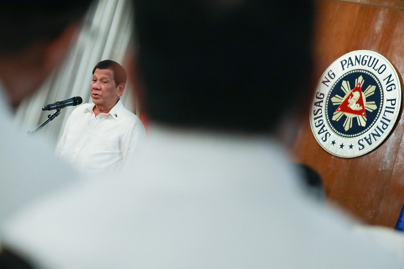 DUTERTE VS MANILA WATER. President Rodrigo Duterte refuses to pay Ayala-led Manila Water the P7.39 billion the government owes based on a recent decision of an arbitration court. File photo by King Rodriguez/Presidential Photo  