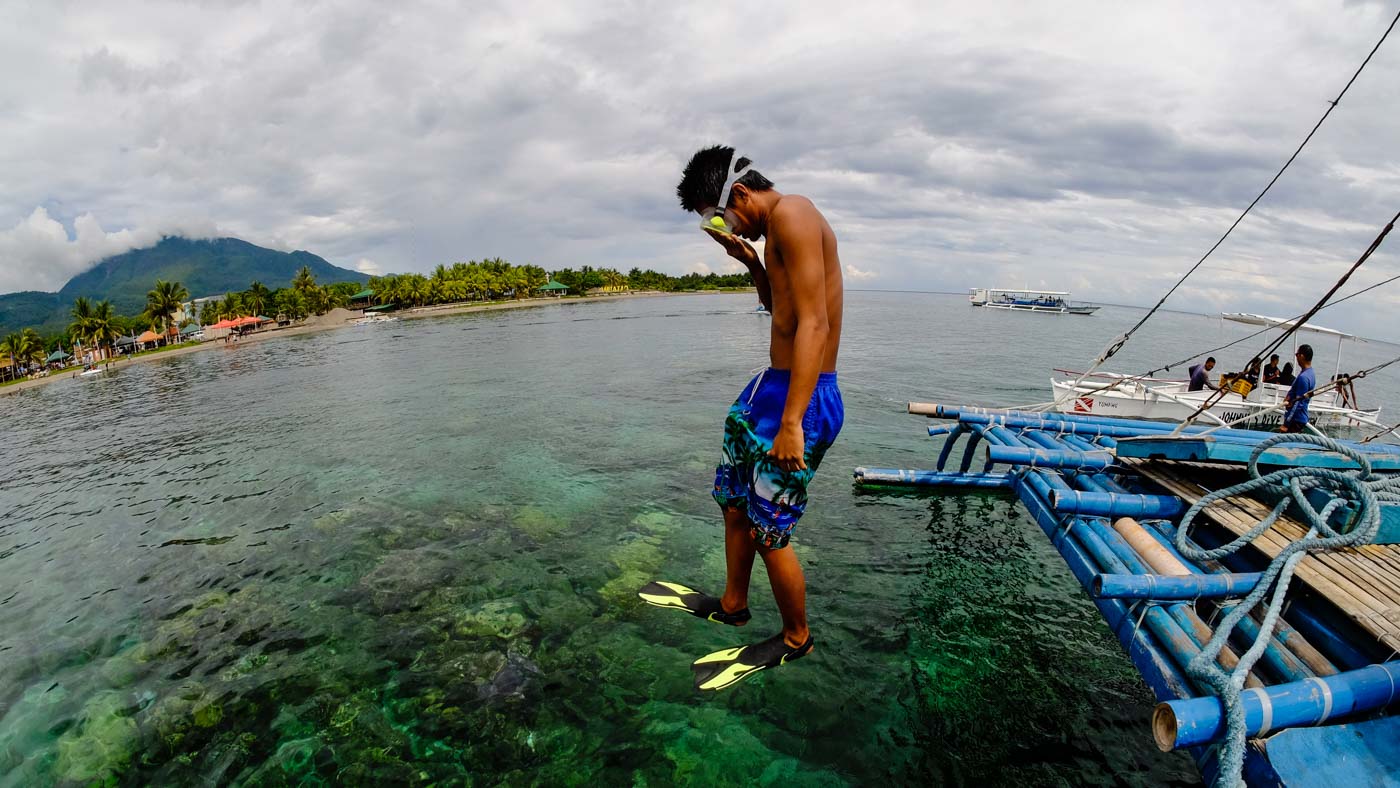 READY GO! local skin diver dives into the clear waters of Camiguin on June 21, 2019, during the launching of the Camiguin Dive Festival. Photo by Bobby Lagsa/Rappler  