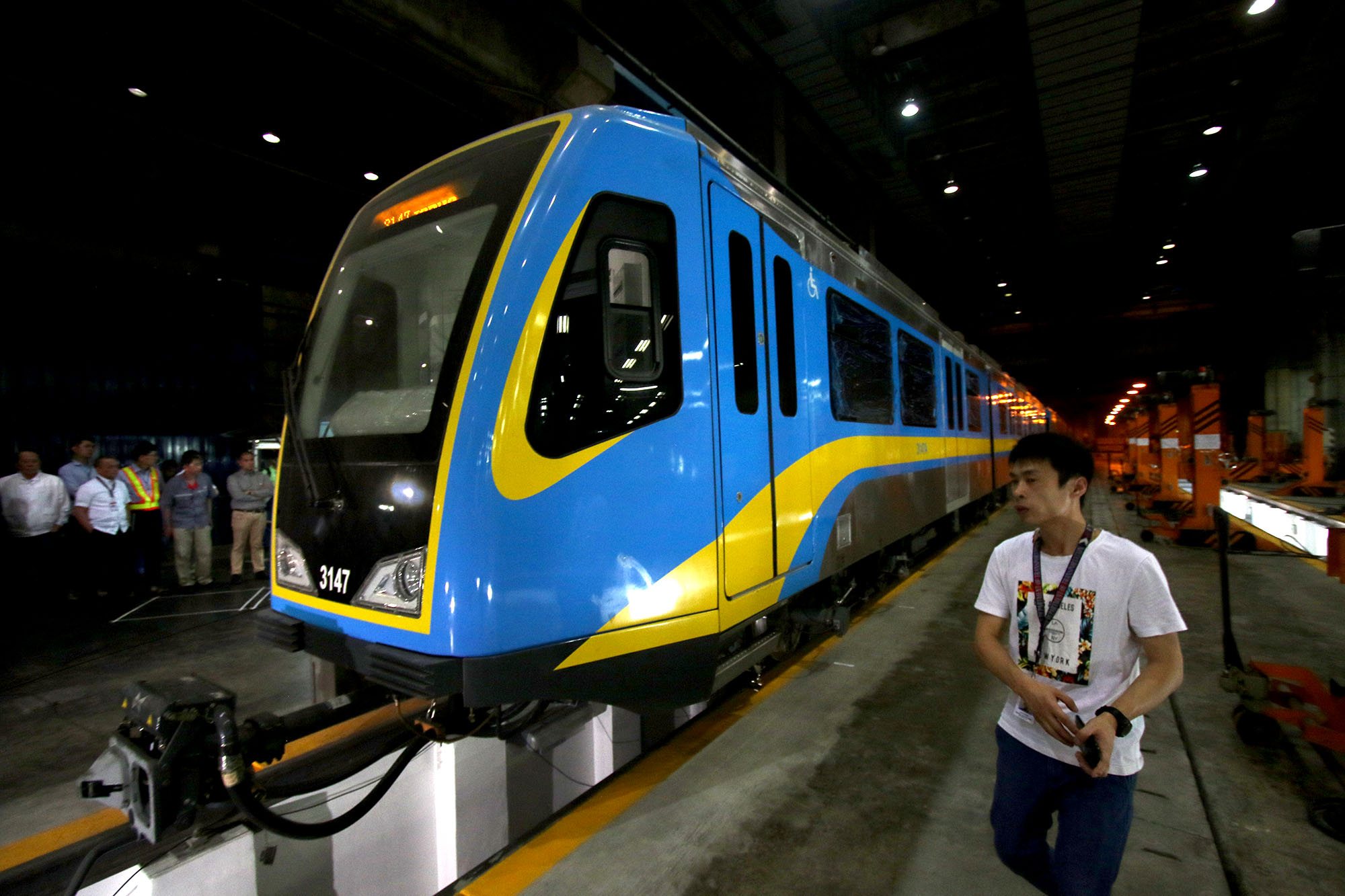 MRT3. DOTr-MRT-3, led by Undersecretary for Railways TJ Batan, TUV Rheinland, and representatives of the Joint ADB-Australia Aid Advisory Panel witness the completion of the weight-testing of Dalian trains in MRT Depot, Quezon City on April 19, 2018. File photo by Inoue Jaena/Rappler  