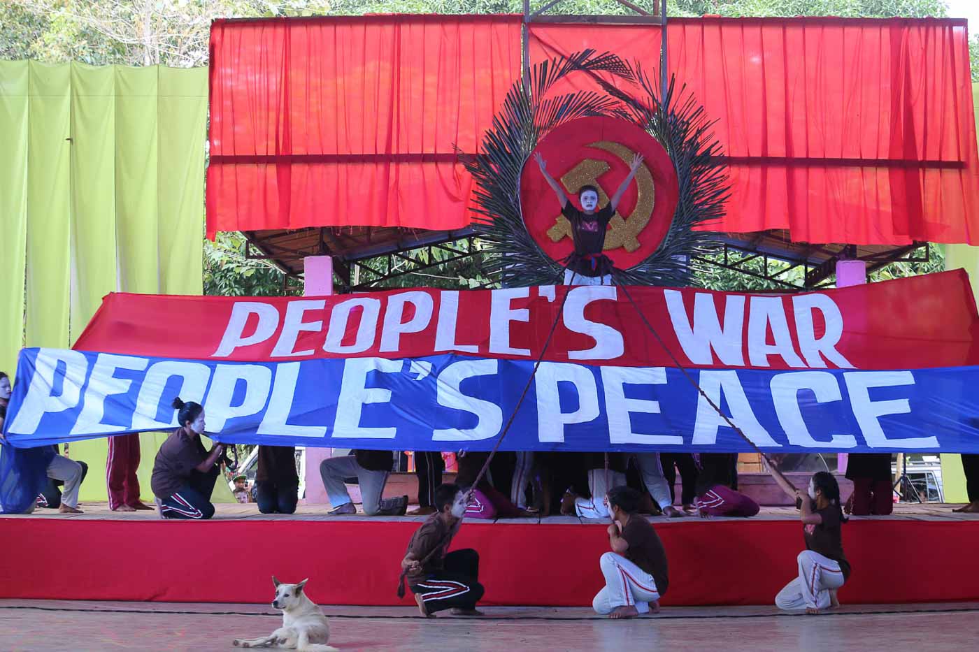 FOR PEACE? The Communist Party of the Philippines celebrates its 48th anniversary with the theme, 'People's War, People's Peace.' Photo by Manman Dejeto/Rappler  