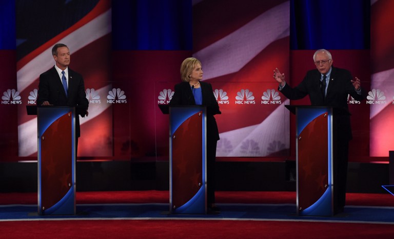 Democratic presidential candidates Martin O'Malley (L), Hillary Clinton (C) and Bernie Sanders (R) participate in the NBC News -YouTube Democratic Candidates Debate on January 17, 2016 at the Gaillard Center in Charleston, South Carolina. Timothy Clary/AFP 