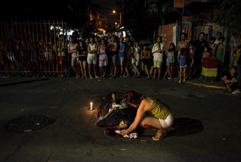 NOT GOING AWAY FROM ACCOUNTABILITY. Human Rights Watch says the Philippines will not get away scot-free from the killings under President Rodrigo Duterte's war on drugs. File photo by Noel Celis/AFP 
