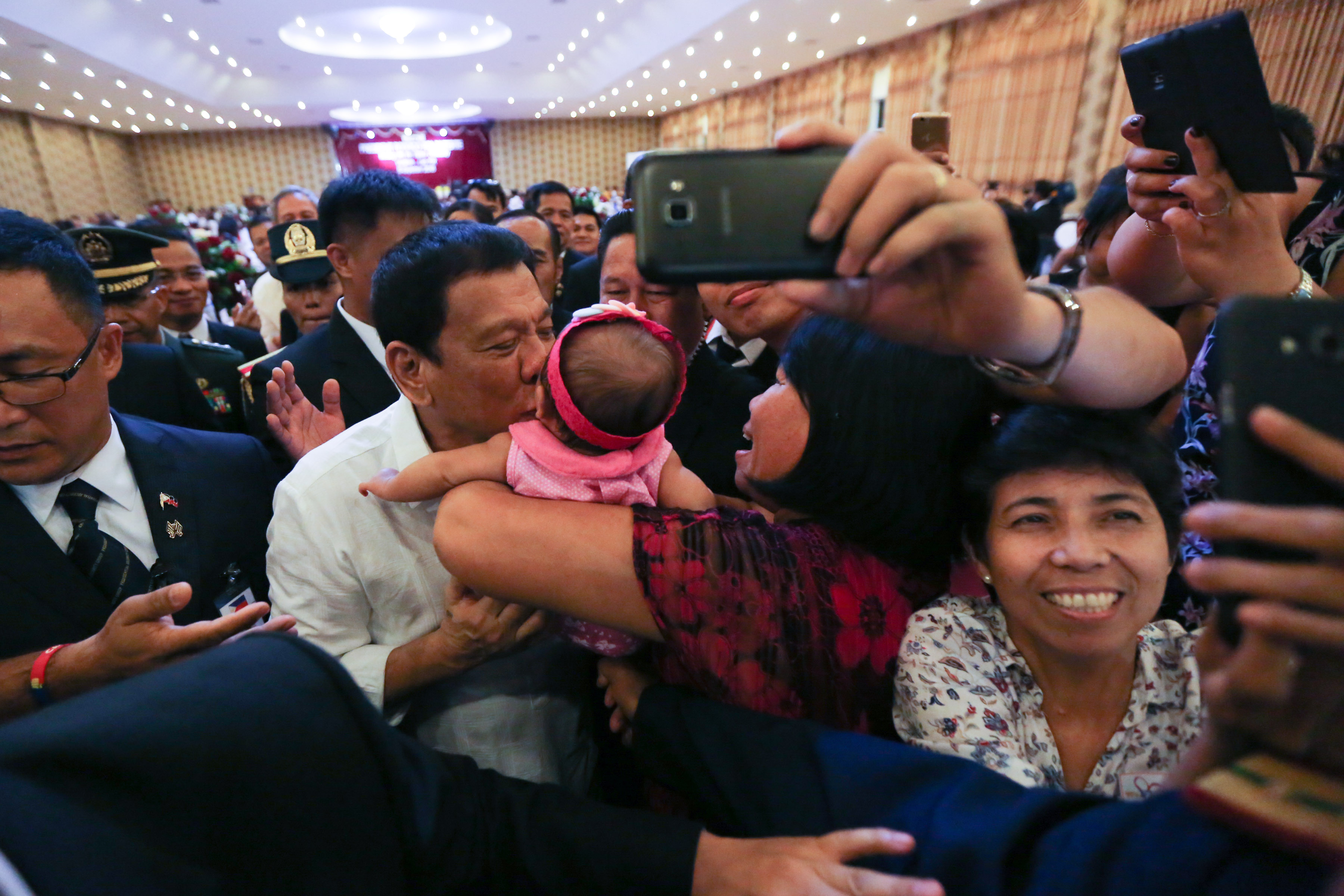 'ROCK STAR'. President Rodrigo Duterte meets with the Filipino community in Laos at Feungfar Convention Hall in Ban Phonsinuane on September 5. Photo by King Rodriguez/PPD  