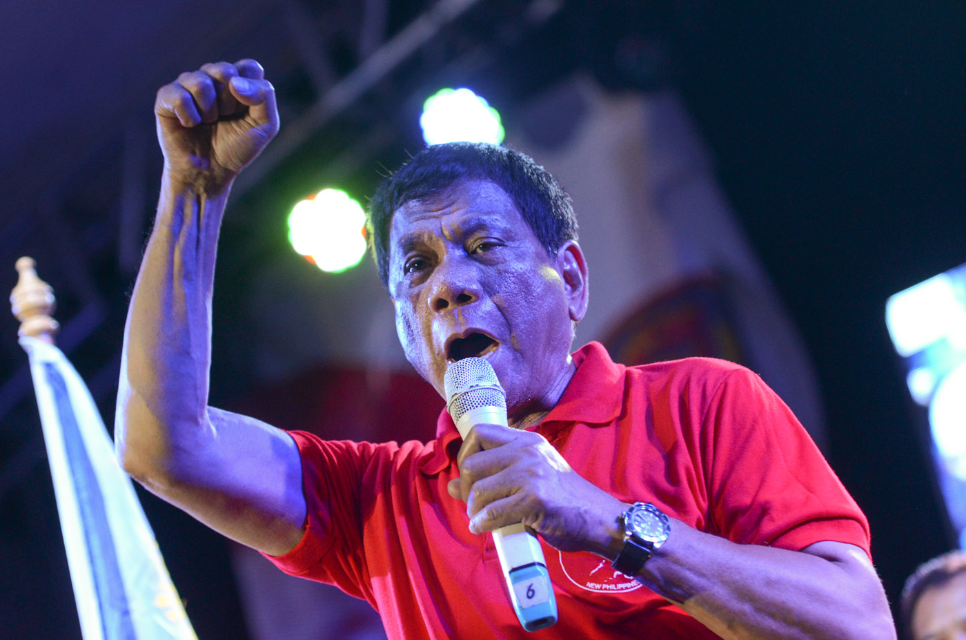 POLL FRONT-RUNNER. Presidential candidate Rodrigo Duterte speaks at a rally in Quezon City on April 12, 2016 
