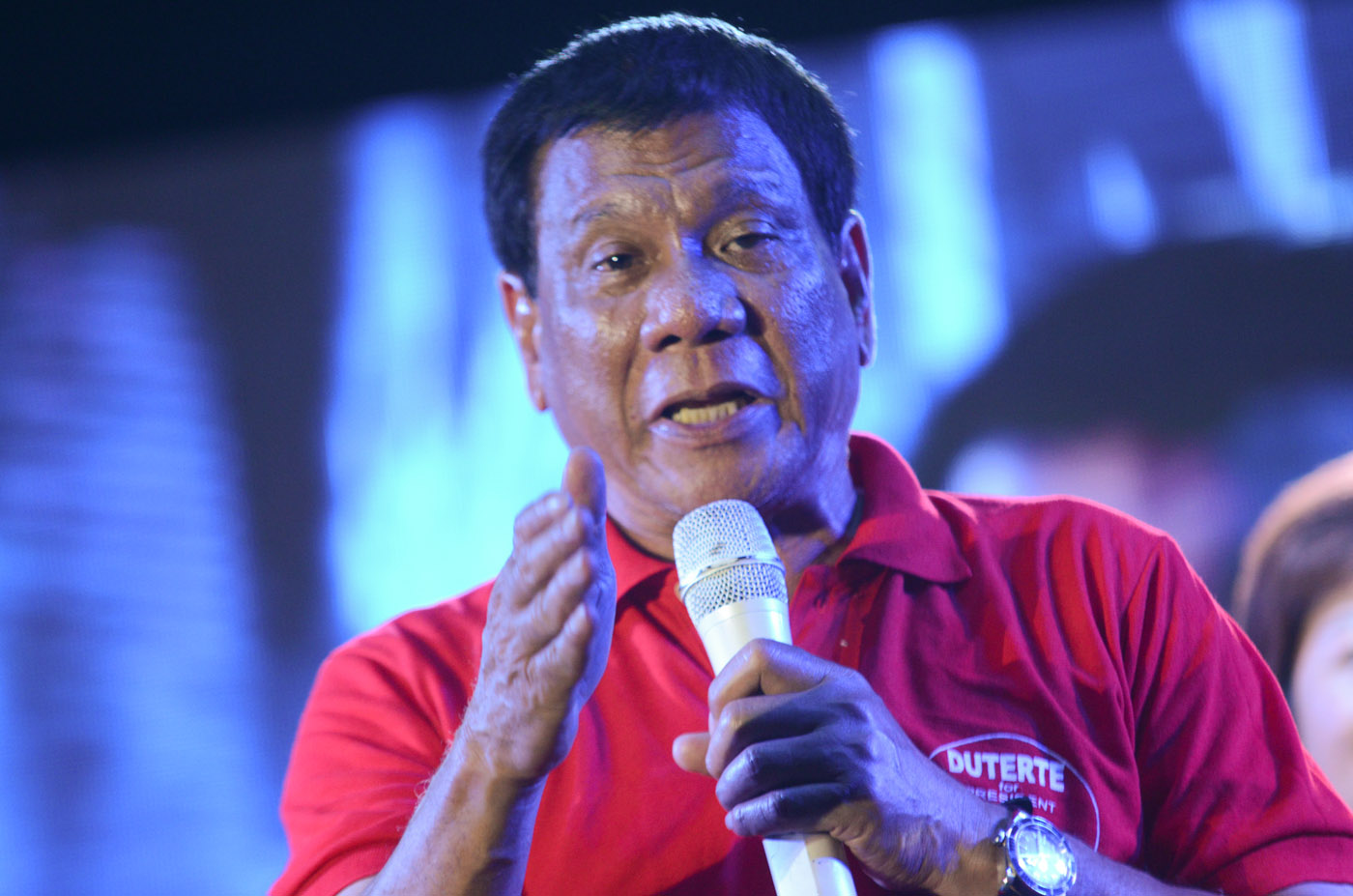 TOPS. Presidential election survey front-runner Davao City Mayor Rodrigo Duterte speaks during a campaign sortie in Quezon City on April 12. Rappler photo  
