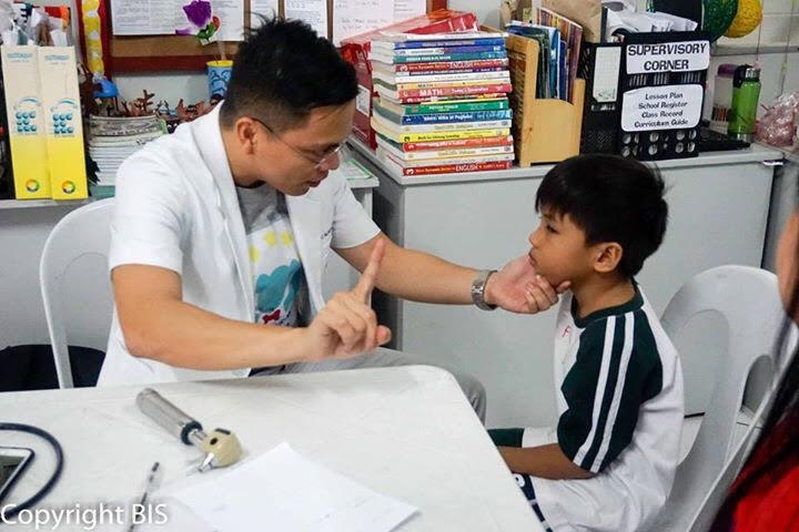 HEALTH CHECK. A kid receives a free check-up from during a medical mission by Project Gifted. Photo by Project Gifted 