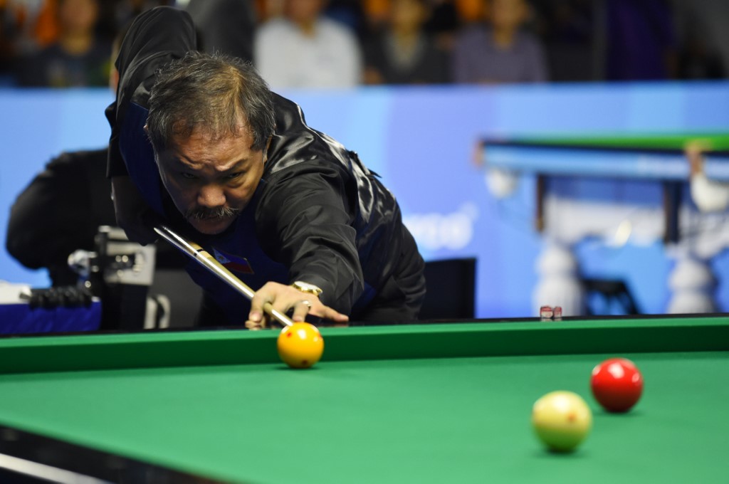 SWAN SONG. Efren ‘Bata’ Reyes represents the Philippines in what could be his last SEA Games. File photo by Sajjad Hussain/AFP
 