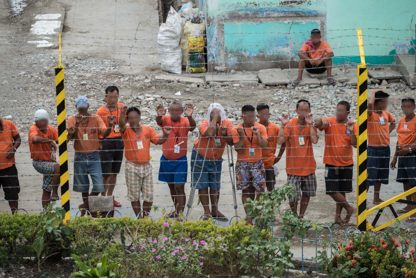 STATE PENITENTIARY. Prisoners at the New Bilibid Prison watch visiting lawmakers checking prison conditions on October 29, 2019. Photos by Lisa Marie David/Rappler
   