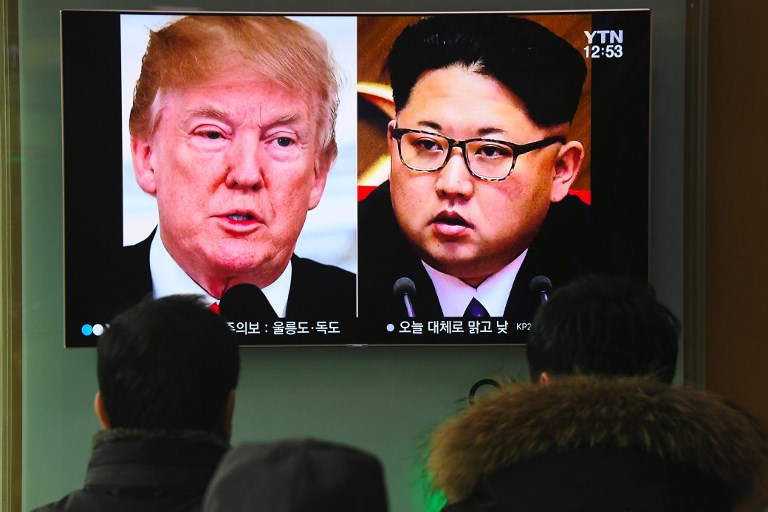 SUMMIT. In this file photo, people watch a television news report showing pictures of US President Donald Trump and North Korean leader Kim Jong Un at a railway station in Seoul. AFP file photo 