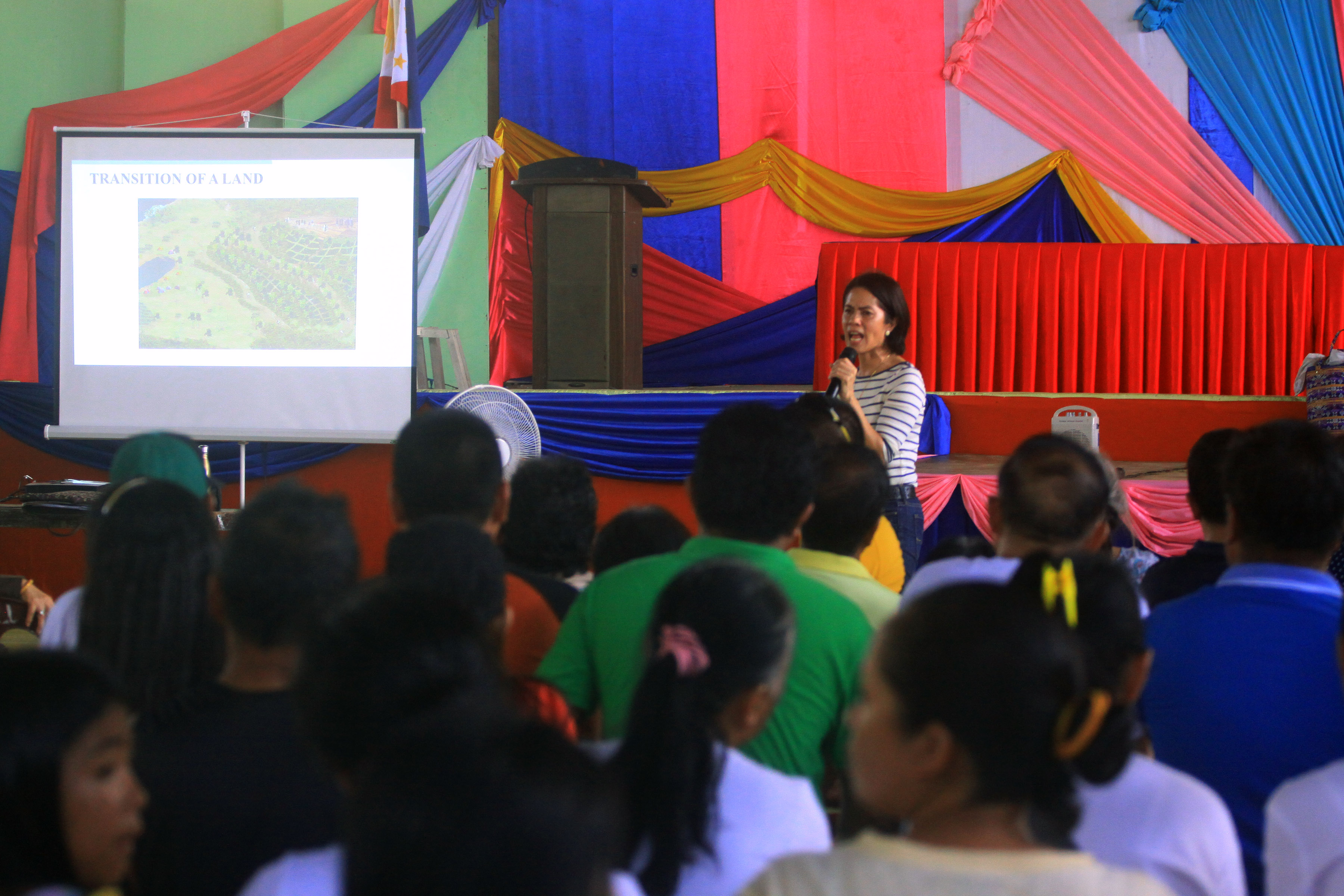 AFTER MINING CLOSURES. Environment Secretary Gina Lopez presents her department's rehabilitation plan to communities affected by her recent decisions. File photo by Bobby Lagsa/Rappler  