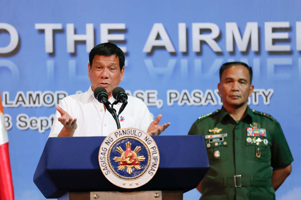 'DON'T LECTURE.' President Rodrigo Duterte, beside Armed Forces chief General Ricardo Visaya, gives a speech at the Villamor Air Base in Pasay City on September 13, 2016. Photo by Toto Lozano/PPD   