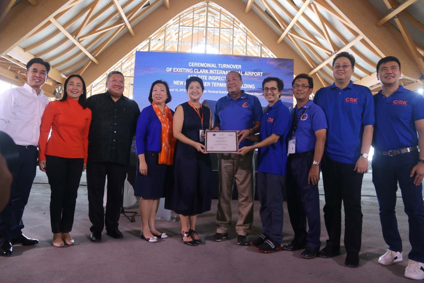 TURNOVER. Lipad Corporation Bi Yong Chungunco (5th from L) and DOTr Secretary Arthur Tugade (6th from R) during the turnover ceremony on August 16, 2019. Photo courtesy of DOTr    