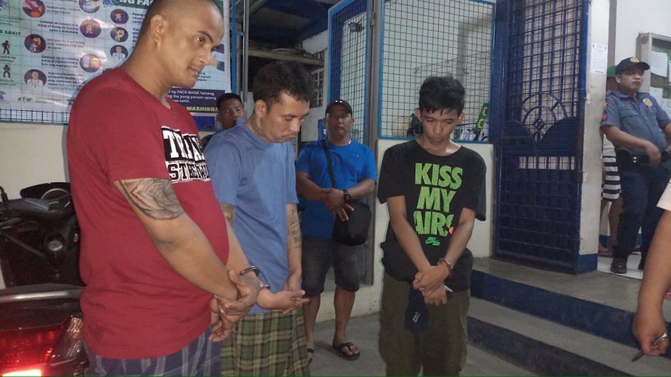 BUY-BUST. The three suspects in a drug buy-buy-bust operation in Bulacan. Photo by Randy V. Datu 
