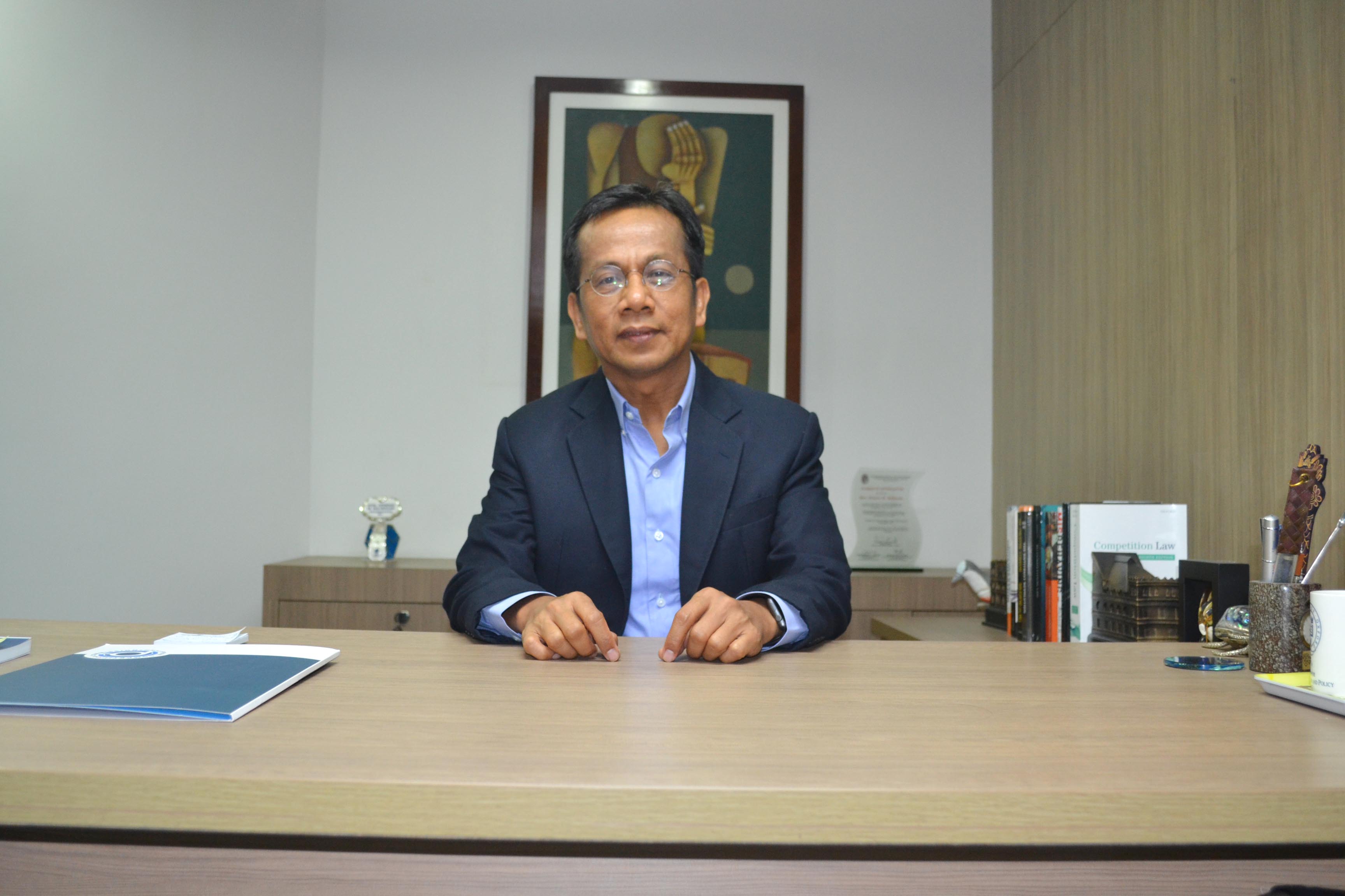 CONTRAST. 'If I will be the one to burden the business community? I would rather resign. That is because it is against what I've been working for and what I believe in,' Balisacan says. Photo by Chrisee Dela Paz/Rappler