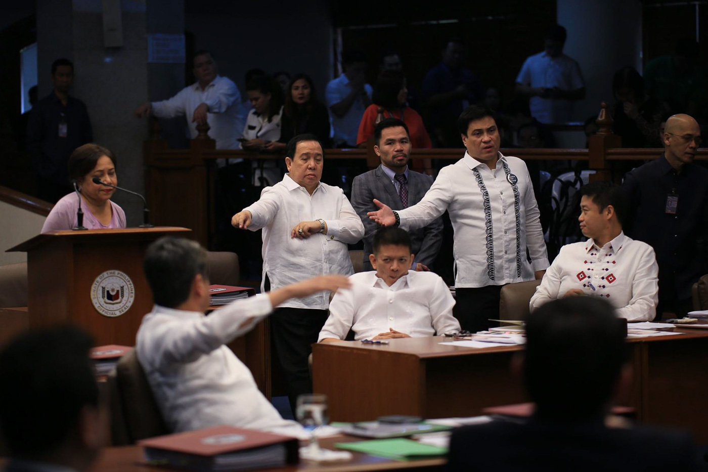 DEBATES. Senators gesture during one of their plenary sessions in 2018. File photo from Senate PRIB  