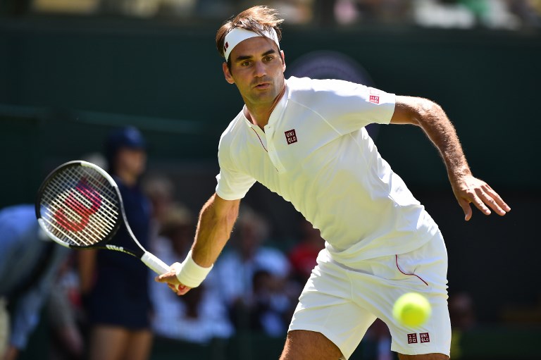 WINNING LOOK. Switzerland's Roger Federer flashes his old form wearing new gear. Photo by Glyn Kirk/AFP 