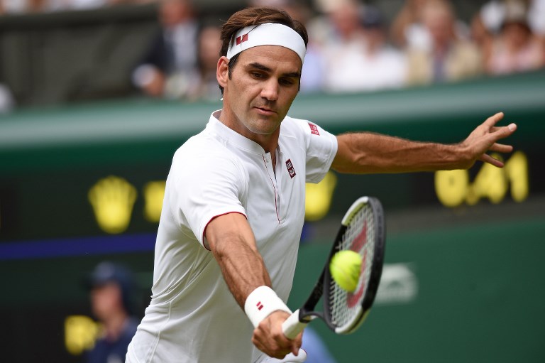 WINNING STREAK. Switzerland's Roger Federer stretches his Wimbledon streak of consecutive-set wins to 26. Photo by Oli Scarff/AFP 
